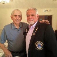 6-18-14 - Italian American Social Club, San Francisco - Presentation of International President’s Certificate of Appreciation to Lion Charles Bottarini for 60 years of service - Charlie Bottarini and District Governor Stephen Picchi after presentation of certificate. Sharon Eberhardt, right background.