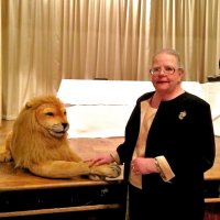 3/30/13 - Police & Firefighters’ Awards Banquet, Patio Espanol Restaurant, San Francisco - Sharon Eberhardt posing with one of the lions.