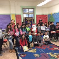 12-15-16 - Christmas with Santa with the help of Los Bomberos Firefighters, Mission Education Center, San Francisco - A class poses with Santa, the Los Bomberos Firefighters, and their teachers.