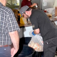 3-5-16 - Mariposa Hunters Point Yacht Club, San Francisco - 31st Annual Crab Feed - Balancing out the cans of crab before adding the marinade. L to R: George Salet, Eddie Marchese, and Mike Spediacci, Jr.