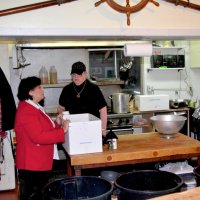 3-5-16 - Mariposa Hunters Point Yacht Club, San Francisco - 31st Annual Crab Feed - Checking up in the kitchen area are Zenaida Lawhon, left, and Sharon Eberhardt; Viela du Pont cleaning up at the sink.