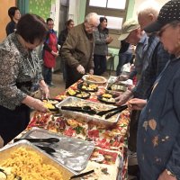 11-18-16 - MEC Thanksgiving Luncheon, Mission Education Center, San Francisco - Just beginning to put the luncheon plates together are, L to R, left, front to back: Viela du Pont, and Joe Farrah; right, front to back: Sharon Eberhardt, Al Gentile, and Bill Graziano.