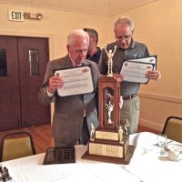 5-18-16 - Italian American Social Club, San Francisco - Setting up to display the plaque, trophy, and certificates won in the District 4-C4 Youth & Activities Raffle. L to R: George Salet, Ward Donnelly, Stephen Martin (partial), and Lyle Workman.