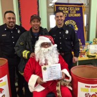 12/21/17 - Christmas with Santa, Mission Educational Center - Santa and his San Francisco Firemen escort, from the SFFD Toys for Tots Program, after receiving his certificate of thanks from the Geneva-Excelsior Lions Club.