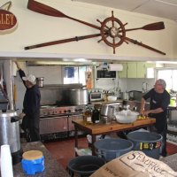 2-18-17 - 32nd Annual Crab Feed, Mariposa Hunters Point Yacht Club, San Francisco - Bob Fenech, left, and a helper getting things going in the kitchen.