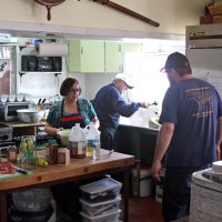 2-18-17 - 32nd Annual Crab Feed, Mariposa Hunters Point Yacht Club, San Francisco - L to R: Viela du Pont, working on the salad, Bob Fenech cleaning up, and a helper.