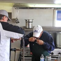 2-18-17 - 32nd Annual Crab Feed, Mariposa Hunters Point Yacht Club, San Francisco - Bob Fenech, on the left, and a helper checking on the crab.