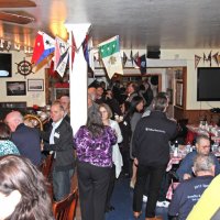 2-18-17 - 32nd Annual Crab Feed, Mariposa Hunters Point Yacht Club, San Francisco - Guests, and members, enjoying drink while waiting for the feed to begin. Seen in the photo are Viela du Pont, Bill Graziano, and Bob Fenech.