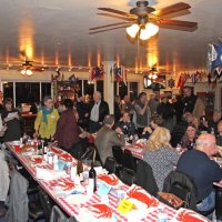 2-18-17 - 32nd Annual Crab Feed, Mariposa Hunters Point Yacht Club, San Francisco - Guest enjoing drinks and finding their seats; Bob Fenech is in the center, under the edge of the TV.