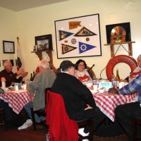 2-18-17 - 32nd Annual Crab Feed, Mariposa Hunters Point Yacht Club, San Francisco - Seating up on the stage for a handful. Diane & Ward Donnelly, and Sharon Eberhardt can be seen.