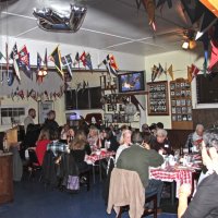 2-18-17 - 32nd Annual Crab Feed, Mariposa Hunters Point Yacht Club, San Francisco - View of the front room - the Salet group on the far left. Also in the photo are Roxanne Gentile, Al Gentile, and Arline Thomas.