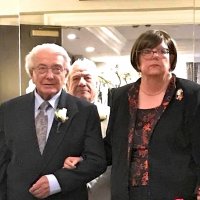 8/10/18 - Cabinet Installation, San Mateo Marriott @ S. F. Airport - Lion Joe Farrah escorting Incoming Zone Chairman Lion Sharon Eberhardt. They are about to be called and enter the Cabinet Installation. They are flanked by Lion PDG Ray Rosenthal of the Foster City Lions.