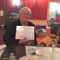 8/15/18 - Italian American Social Club - Lion Denise Kelly showing off her Certificate of Appreciation and club banner following her presentation on the North Peninsula Food Pantry & Dining Center in Daly City.