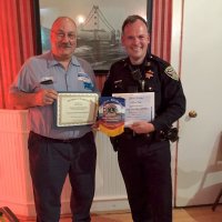 9/19/18 - Guest speaker SFPD Capt. Jack Hart, Italian American Social Club - Lion President George Salet with Capt. Jack Hart, both displaying Certificates of Recognition received and Club banner.