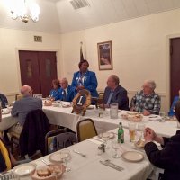 10/17/18 - District Governor's Visitation, Italian American Social Club - L to R outside of table: Lions Al Gentile, Zone Chair Jessie Peoples, Regional Chair Richard Loewen, District Governor Lydia Taylor-Bellinger, President George Salet, Secretary Joe Farrah, 1st Vice District Governor Helen Ariz Casaclang, and Sharon Eberhardt. Inside table: Lion Bill Graziano (gray shirt), and visiting Lion Hernaldo Martinez from Pedregal, Panama (in vest.) Lion District Governor Lydia giving her remarks which she kept short and sweet.