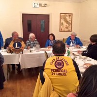 10/17/18 - District Governor's Visitation, Italian American Social Club - L to R outside of table: Lions District Governor Lydia Taylor-Bellinger, President George Salet, Secretary Joe Farrah, 1st Vice District Governor Helen Ariz Casaclang, Cabinet Secretary Denise Kelly, and Sharon Eberhardt. Inside table: Lion Bill Graziano (gray shirt), and visiting Lion Hernaldo Martinez from Pedregal, Panama (in vest.) Lion Cabinet Secretary Denise Kelly clarifying some info during the Governor's remarks.