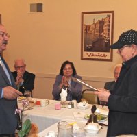 06/20/18 - 69th Installation of Officers, Italian American Social Club, San Francisco - L to R: Lions Bill Graziano (partial), George Salet, incoming President, Ward Donnelly, Zenaida Lawhon, Al Gentile (partial), and Sharon Eberhardt Eberhardt, outgoing President. As one of his first official acts, Lion George Salet presenting Lion Sharon Eberhardt with her Past Presidents plaque and thanking her for her two years of leadership.
