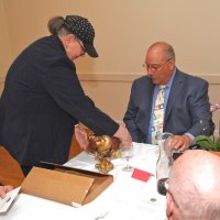 06/20/18 - 69th Installation of Officers, Italian American Social Club, San Francisco - Outgoing Lion President Sharon Eberhardt presenting newly installed Lion President George Salet with a congratulatory cake.