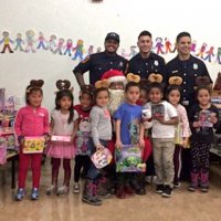 12/18/18 - Los Bomberos Firefighters with Santa at Mission Education Center - Santa, and crew, with the kindergarten class.