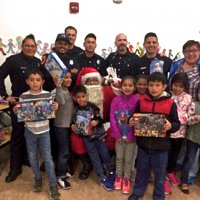 12/18/18 - Los Bomberos Firefighters with Santa at Mission Education Center - Santa, and crew, with the third grade class.