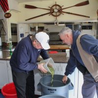 2/24/18 - 33rd Annual Crab Feed - Lions Bob Fenech and Steve Martin pouring marinade on the crab.