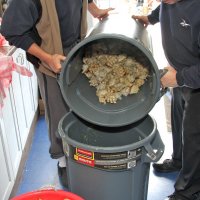 2/24/18 - 33rd Annual Crab Feed - Lions Bob Fenech and Steve Martin stirring the crab by pouring from one container to another.