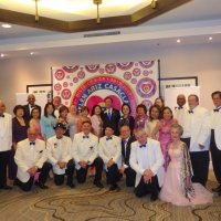 7/26/19 - Marriott Hotel S. F. Airport - District 4-C4 Cabinet Installation; Lion Zone Chair Sharon Eberhardt (standing, far left) with International President Dr. Lion Jung-Yul Choi (standing center, black suit.)