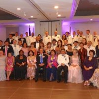 7/26/19 - Marriott Hotel S. F. Airport - District 4-C4 Cabinet Installation; International President Dr. Lion Jung-Yul Choi (seated center, black suit) with Lion Zone Chair Sharon Eberhardt (standing, 2nd row, 2nd from right.)