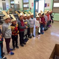 12/13/19 - Mission Education Center Christmas with Santa and Los Bomberos Firefighters - children lining up and preparing to sing a song for Santa.