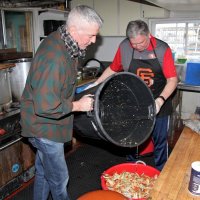 2/23/19 - 34th Annual Crab Feed - Lions Steve Martin and Bob Fenech (chairman) mixing, and distributing the marinade, by pouring from one container to another. Good to the last drop.