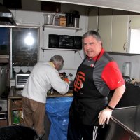 2/23/19 - 34th Annual Crab Feed - Dynamo guest Rose Ann Harris preparing the pesto sauce with Lion Bob Fenech (chairman).