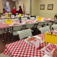 2/8/20 - 35th Annual Crab Feed at St. Philip the Apostle Church - by Lion Bob Lawhon - Tables are all set and ready for guests to arrive. Lion Sharon Eberhardt, with friends, in the background.