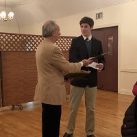 1/15/20 - Student Speaker Contest at the I.A.S.C - Topic: Homelessness in California: What is the Solution? - Lion Chairman Paul Corvi presenting winner’s check and certificate to Michael Gray. Lion Bob Fenech on the right.