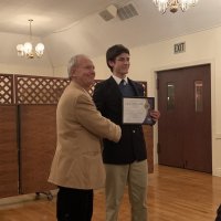 1/15/20 - Student Speaker Contest at the I.A.S.C - Topic: Homelessness in California: What is the Solution? - Lion Chairman Paul Corvi with student speaker Michael Gray showing off his winner’s  certificate.