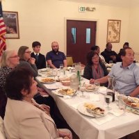 1/15/20 - Student Speaker Contest at the I.A.S.C - Topic: Homelessness in California: What is the Solution? - Left side of table: Lion Zenaida Lawhon, guest judge Ellen Paul, Elizabeth Crudo (Michael’s mother), student speaker Michael Gray, with Coach Joey Klobas. Far end of head table: Noriz and Henry Larkin with daughter Xiomara Larkin, student speaker. Right side of table: guest judge Kevin Chan and his wife. Rosalinda Corvi, wife of Lion Chairman Paul Corvi, (partly hidden) behind Kevin Chan.