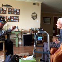 8/19/21 - Al Gentile’s Home, San Mateo - Bob Lawhon, left, and Al Gentile talking about the insurance business, Al was with New York Life for 75 years, the Geneva-Excelsior Lions’ members who have come and gone by, and Iwo Jima during World War II.