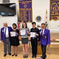 5/1/21 - Burlingame Lions Hall, Burlingame - Topic: Distance and Online Learning: Pros and Cons? - Student Speaker contestants Askansksha Sinha (Foster City Lions), Amelia Harris (Burlingame Lions), and Jason Fong (Geneva-Excelsior Lions) with two cabinet officers helping with the contest on Saturday, May 1st.