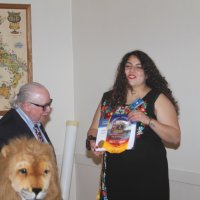 8-17-22 - 73rd Installation of Officers, Italian American Social Club - Bob Lawhon presenting newly installed member Iliana Escadero with a club banner.
