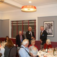 7-19-23 - Basque Cultural Center, South San Francisco - 74th Installation of Officers - PDG Mario Benavente, center, going over Incoming President Steve Martin’s, on right, duties while outgoing President Bob Lawhon looks on.