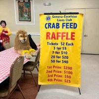 2-25-23 - 36th Annual Crab Feed - St. Philip the Apostle Church, San Francisco - Raffle details with Suzie Moy, on the left, with our Lion mascot.