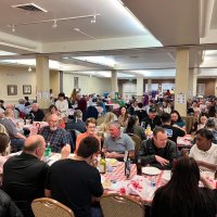 2-25-23 - 36th Annual Crab Feed - St. Philip the Apostle Church, San Francisco - Guests enjoying the salad; center left is George and Kathy Salet. Also shown, somewhere in there, is Bill Mayta, Bob Lawhon, and Lyle Workman.