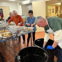 2-25-23 - 36th Annual Crab Feed - St. Philip the Apostle Church, San Francisco - Getting the crab into serving trays are, L to R, Bob Fenech, Rose Ann Harris, Paul Corvi, Leona Wong, and Steve Martin.