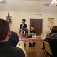 1-18-23 - Italian American Social Club, San Francisco - Club Student Speaker Contest - Speaker Saahil Mishra makes his presentation as Bob Lawhon and Paul Corvi look on.